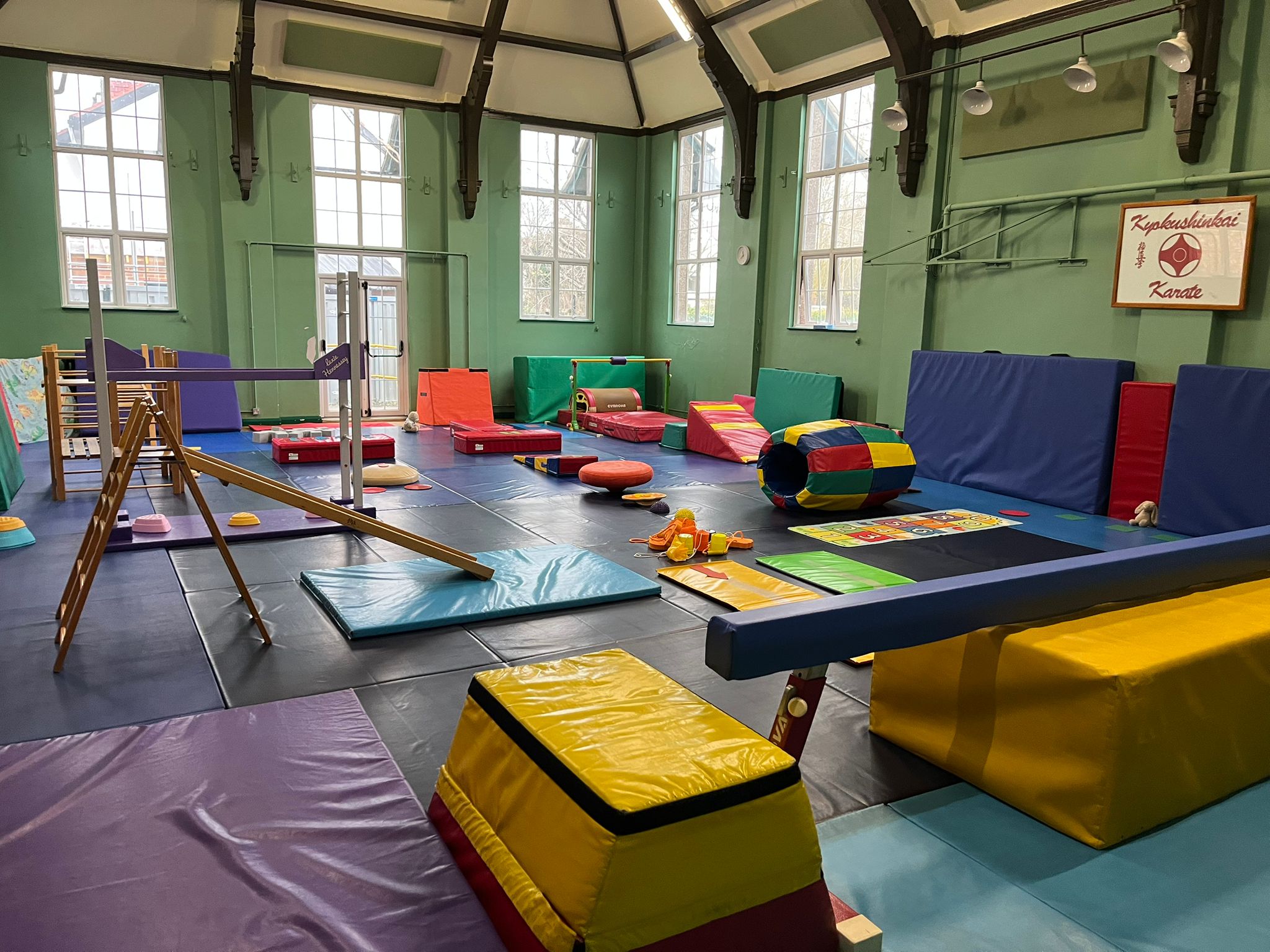 Children moving through equipment in the TJ's gymnastics hall